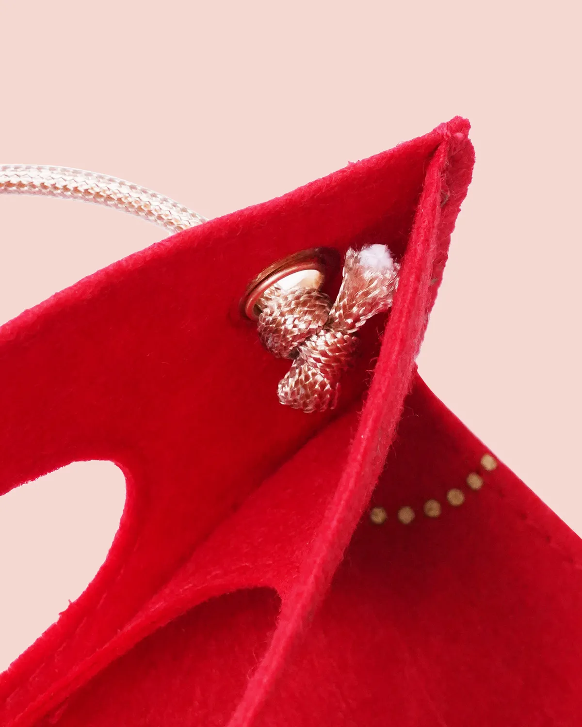 フェルト小判抜きバッグロー引き紐_大小_紐結び目